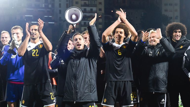 Eden Hazard celebrates with his Belgium team-mates after defeating Andorra to qualify for the European Championships. 