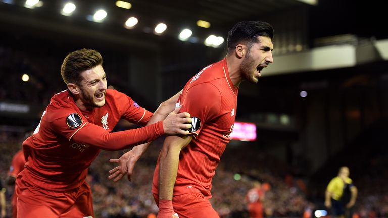 Emre Can (R) of Liverpool is congratulated by team-mate Adam Lallana after scoring a goal to level the scores v Rubin Kazan in the UEFA Europa League