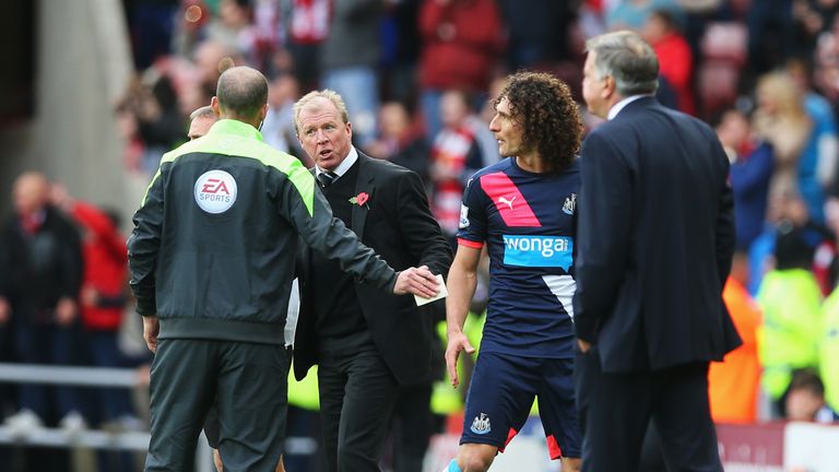 Fabricio Coloccini of Newcastle is show a red card against Sunderland