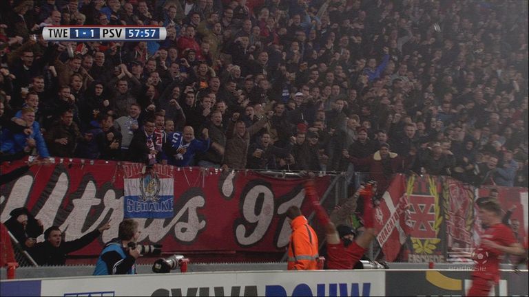 FC Twente's Hakim Ziyech slips and falls while celebrating his equaliser