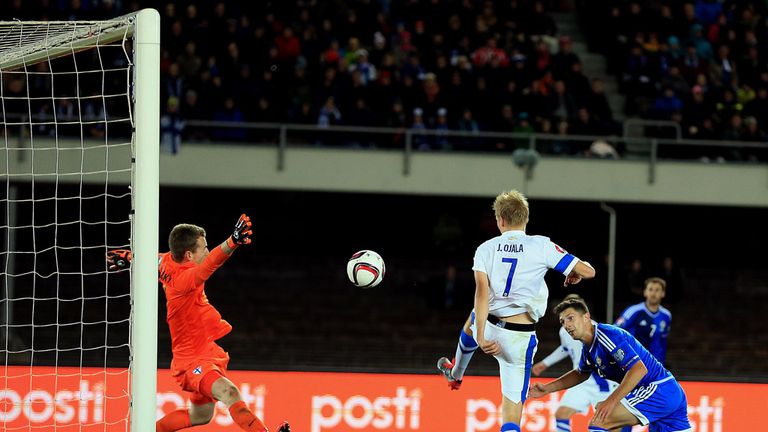 Craig Cathcart heads Northern Ireland into the lead