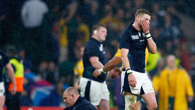 Finn Russell of Scotland reacts with team mates after the 2015 Rugby World Cup Quarter Final match between Australia and Scotland