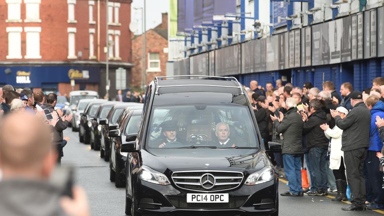 Mourners line Goodison Street as Howard Kendall's cortege passes Goodison Park 