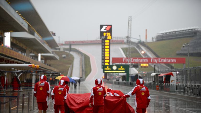 Ferrari team in the rain at CoTA