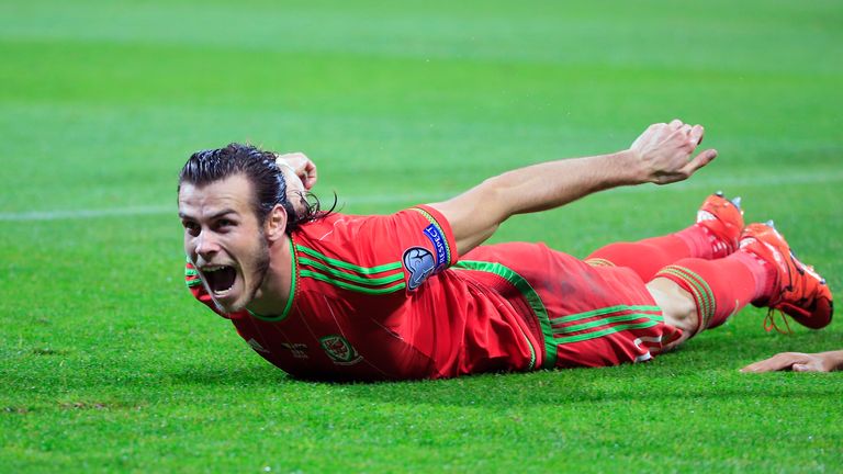 Gareth Bale celebrates after the Euro 2016 qualifying football match between Bosnia and Herzegovina and Wales 