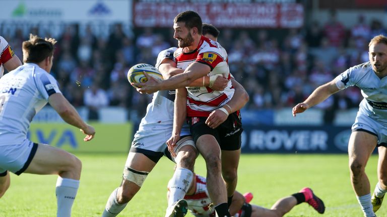 Jonny May of Gloucester looks to offload