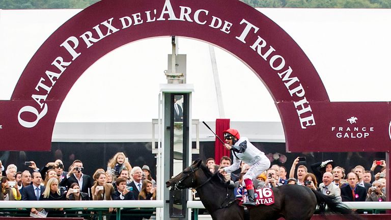 Italian jockey Frankie Dettori riding Golden Horn crosses the finish line to win the Qatar Prix de l'Arc de Triomphe 