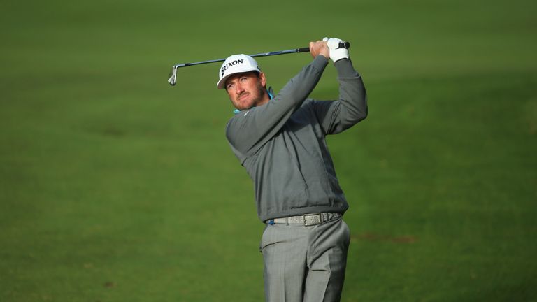 WOBURN, ENGLAND - OCTOBER 08:  Graeme McDowell of Northern Ireland plays his second shot on the 13th hole during the first round of the British Masters 