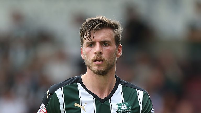 NORTHAMPTON, ENGLAND - AUGUST 22:  Graham Carey of Plymouth Argyle in action during the Sky Bet League Two match between Northampton Town and Plymouth Argy