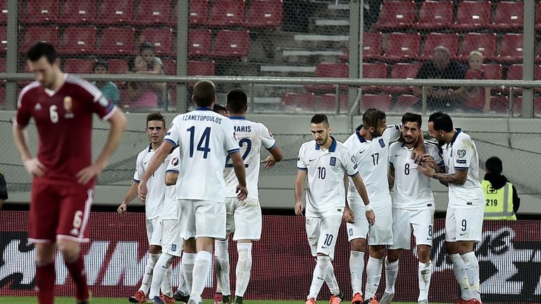 Greece's midfielder Panagiotis Kone celebrates after a late winner against Hungary. 