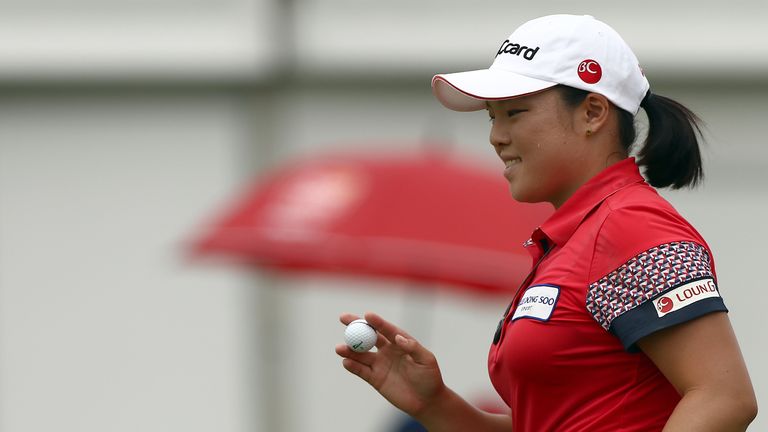 KUALA LUMPUR, MALAYSIA - OCTOBER 09:  Ha Na Jang of South Korea reacts after sinking a birdie on the 18th hole during round two of the Sime Darby LPGA Tour
