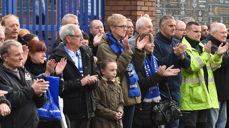 Mourners applaud as Howard Kendall's funeral cortege passes Goodison Park
