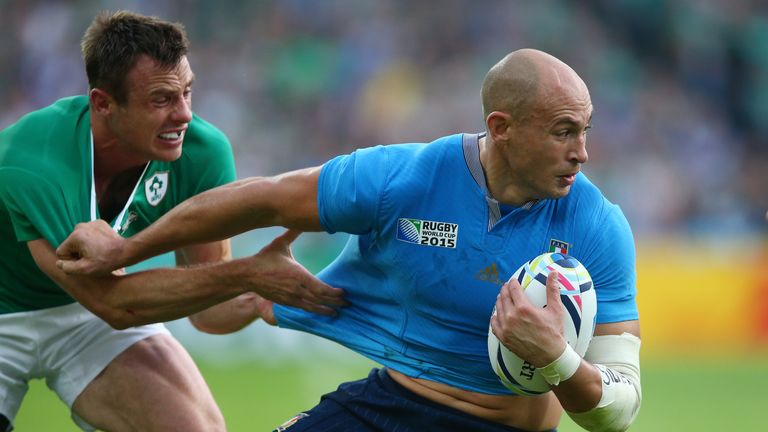 Sergio Parisse of Italy is tackled by Tommy Bowe - the Italian was once again inspirational for his side