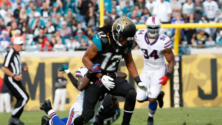 Mike Brown #12 of the Jacksonville Jaguars fumbles during the game against the Buffalo Bills at EverBank Field on December