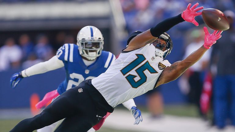 INDIANAPOLIS, IN - OCTOBER 4: Allen Robinson #15 of the Jacksonville Jaguars reaches for a pass as Darius Butler #20 of the Indianapolis Colts watches at L