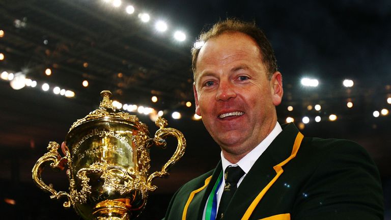 South Africa Head Coach Jake White poses with the trophy following his team's victory in the 2007 Rugby World Cup final