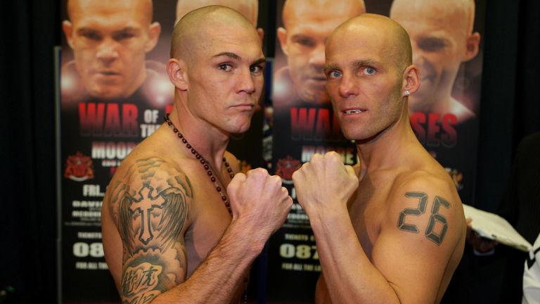 Jamie Moore (left) and Ryan Rhodes weigh in at the Bolton Arena, Bolton.