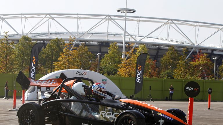 Jason Plato drives an Ariel Atom in the shadow of the Olympic Stadium