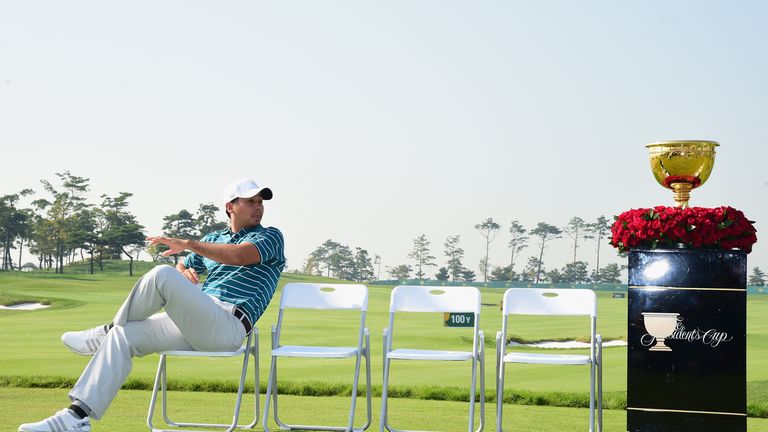 Jason Day with the Presidents Cup trophy