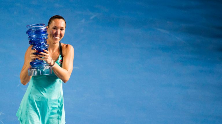 Jelena Jankovic of Serbia poses with the trophy after winning the final macht of the WTA Prudential Hong Kong Open against Angeliq