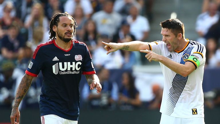 LOS ANGELES, CA - DECEMBER 07:  Robbie Keane #7 of the Los Angeles Galaxy yells instructions to a teammate as Jermaine Jones #13 of the New England Revolut
