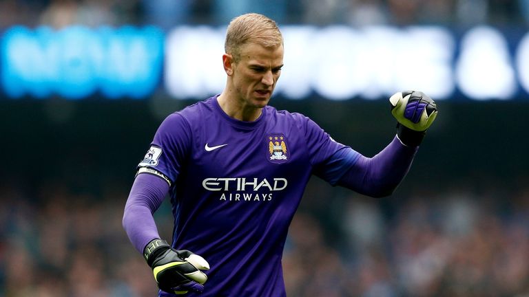 Joe Hart of Manchester City celebrates his team's first goal during the Barclays Premier League match between Manchester City and Newcastle
