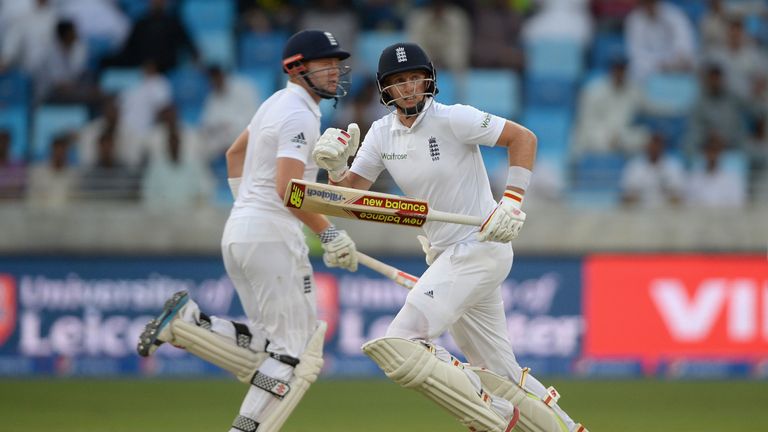 Joe Root and Jonathan Bairstow of England score runs during day two of the 2nd test match between Pakistan and England