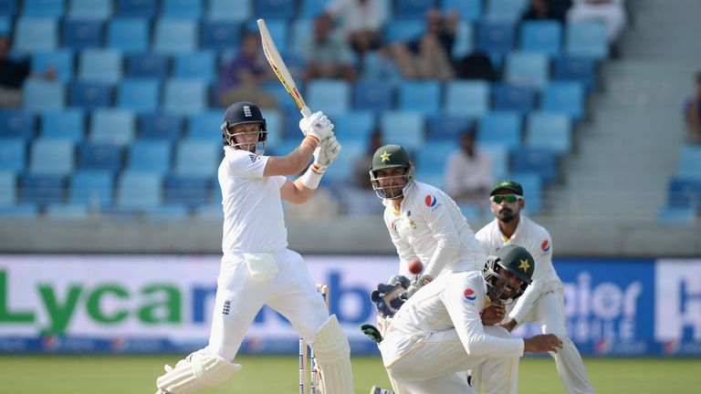 Joe Root pulls a delivery past Shan Masood