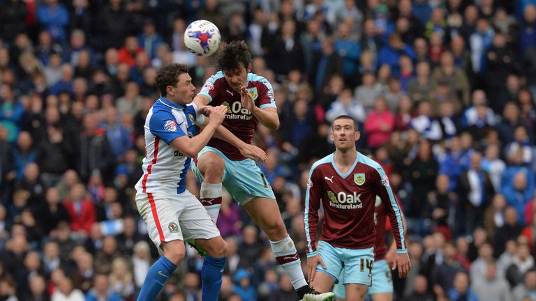 Burnley's Joey Barton (right) and Blackburn's Corry Evans challenge for a header
