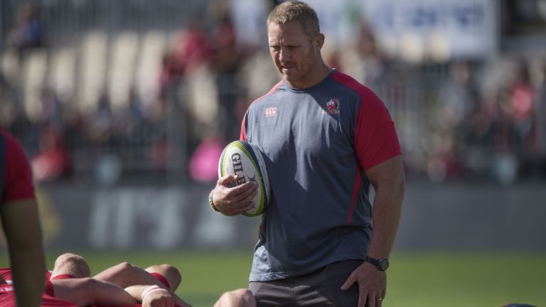 Johan Ackermann watches on as the Lions pack down for a scrum during practice