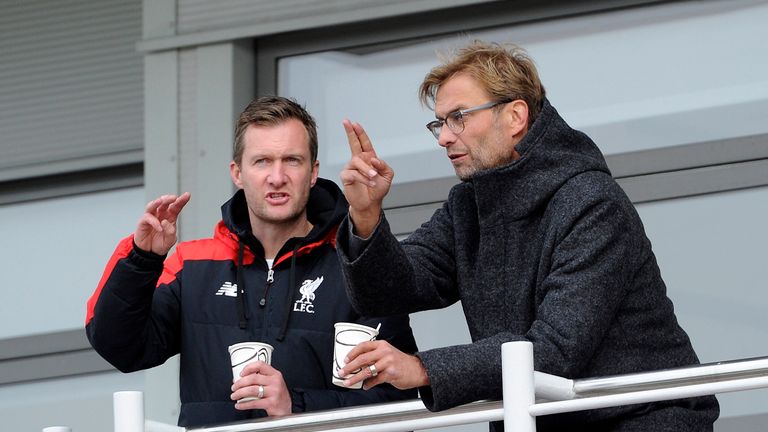 Jurgen Klopp talks tactics with Academy Director Alex Inglethorpe during the Liverpool v Stoke City U18 game