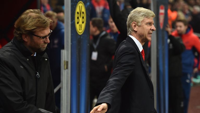 Dortmund's head coach Jurgen Klopp is greeted by Arsenal's Arsene Wenger before the Champions League game in 2014