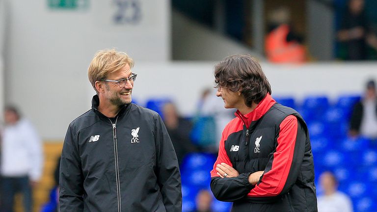 Liverpool manager Jurgen Klopp and assistant Zeljko Buvac look on during warm-up during the Barclays Premier League match at White Hart Lane, London.