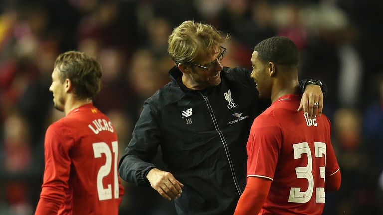  Jurgen Klopp, manager of Liverpool celebrates victory with Jordon Ibe of Liverpool after the Capital One Cup Fourth Round