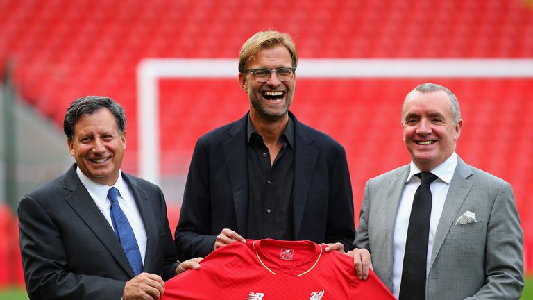 Jurgen Klopp is unveiled as the new manager of Liverpool FC as he stands alongside Tom Werner (l) the chairman and Ian Ayre (r) the chief executive