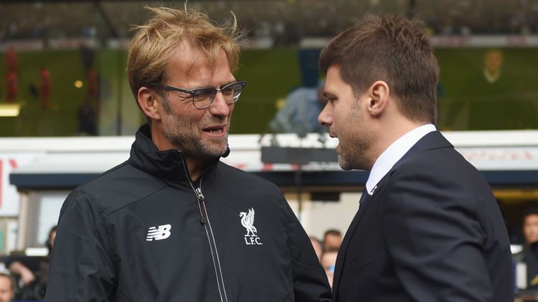 LONDON, ENGLAND - OCTOBER 17:  Jurgen Klopp, manager of Liverpool and Mauricio Pochettino Manager of Tottenham Hotspur greet prior to the Barclays Premier 