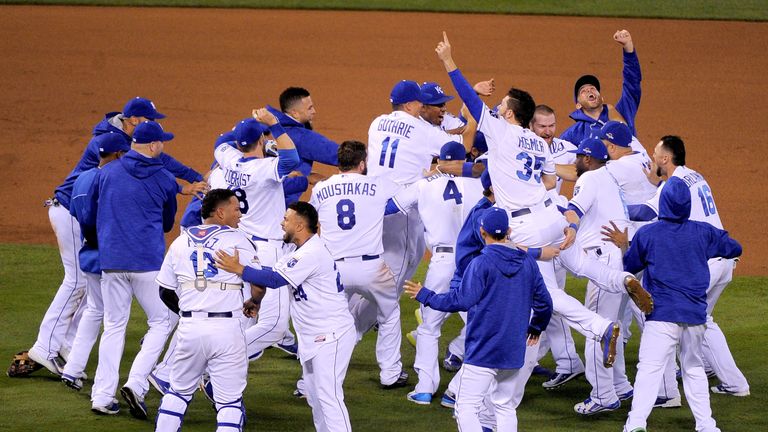 The Kansas City Royals celebrate after winning the ALCS