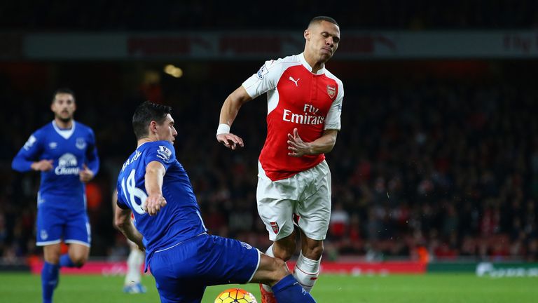 Everton's Gareth Barry fouls Kieran Gibbs of Arsenal to earn a second booking and a red card