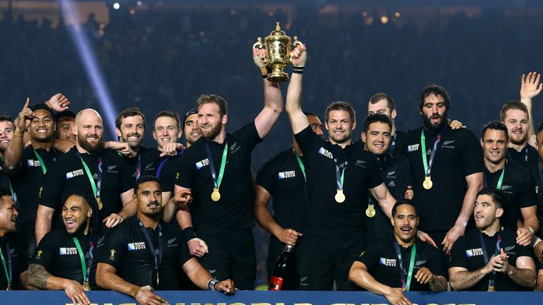 New Zealand captain Richie McCaw (centre right) and Kieran Read (centre left) lift the Webb Ellis Cup after the Rugby World Cup Final at Twickenham, London