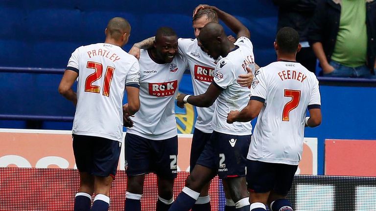 Bolton Wanderers' Shola Ameobi celebrates scoring the first goal of the game against Leeds