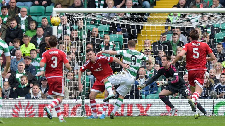 Leigh Griffiths heads Celtic into the lead against Aberdeen