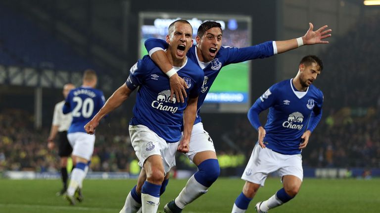 LIVERPOOL, ENGLAND - OCTOBER 27: Leon Osman of Everton celebrates scoring his side's first goal with team-mate Ramiro Funes Mori during the Capital One Cup