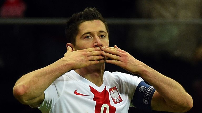 Poland's Robert Lewandowski reacts after scoring the winning goal.