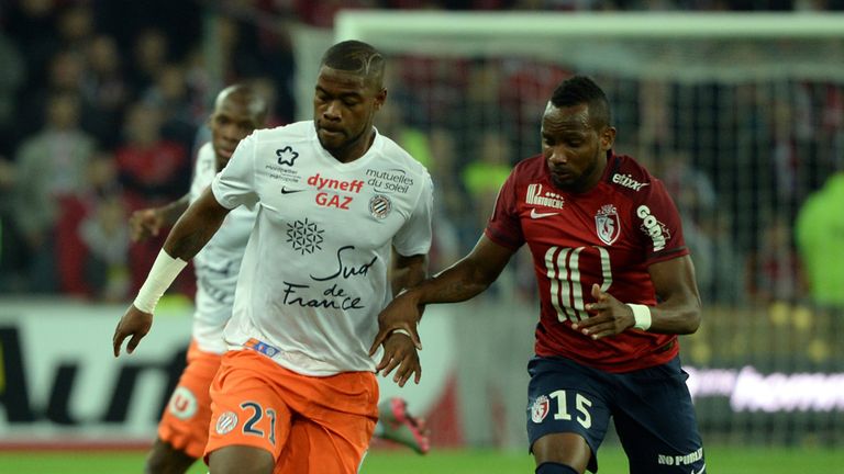 Lille's French forward  Lenny Nangis (R) vies with Montpellier's French defender William Remy during the 
