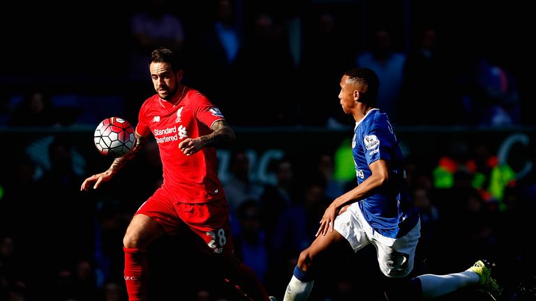 Liverpool's Danny Ings competes with Everton's Brendan Galloway