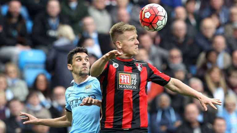Manchester City's Spanish midfielder Jesus Navas (L) vies with Bournemouth's English midfielder Matt Ritchie during a English Premier league match