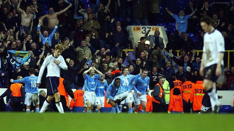 Manchester City players celebrate at the end of the FA Cup fourth round replay match against Tottenham Hotspur at White Hart Lane