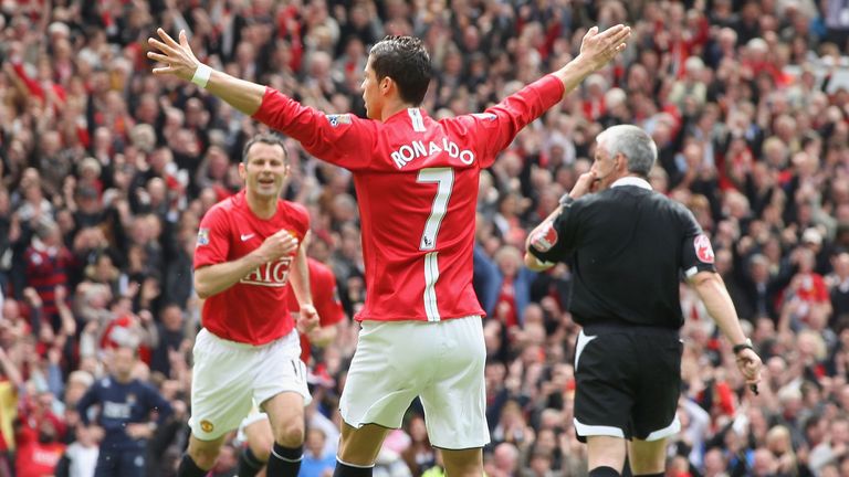 Cristiano Ronaldo of Manchester United celebrates scoring their first goal during the derby of  May 10 2009