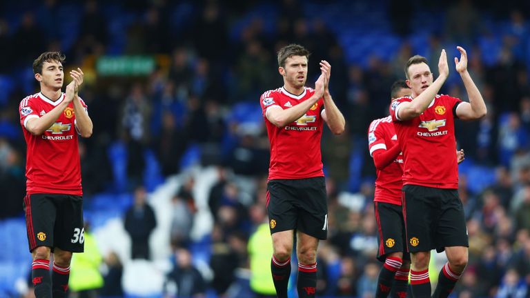 LIVERPOOL, ENGLAND - OCTOBER 17: (L to R) Matteo Darmian, Michael Carrick and Phil Jones of Manchester United celebrate their 3-0 win in the Barclays Premi