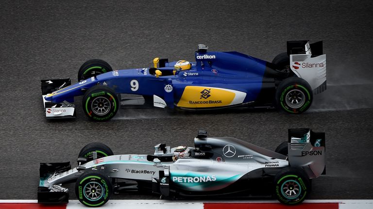 Marcus Ericsson and Lewis Hamilton